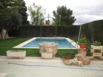 CHALET CON 1.000M2 4 DORMITORIOS Y PISCINA